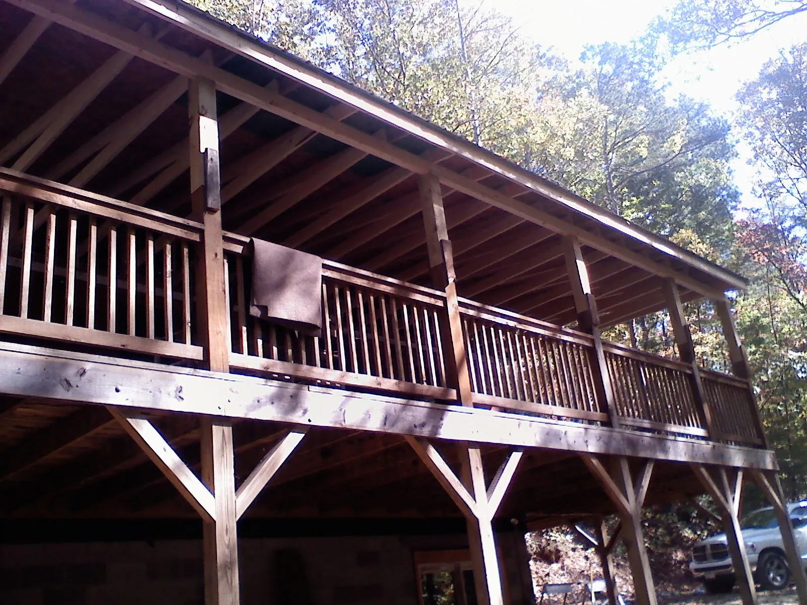 Timber framing under a new elevated porch and deck — Roof Leak Repair in Gillsville by Roofing Brothers